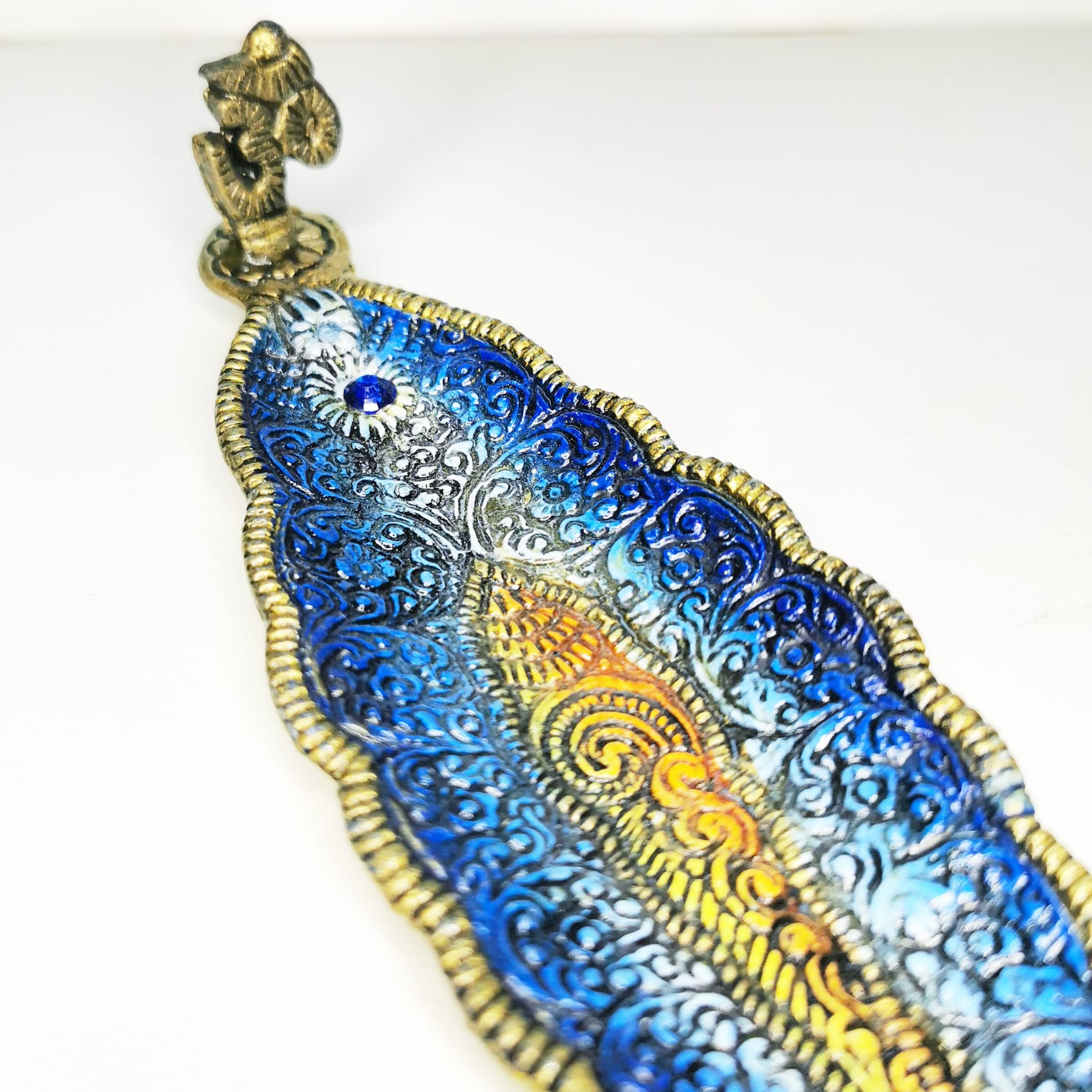 Rökelsehållare format som ett löv Blå närbild