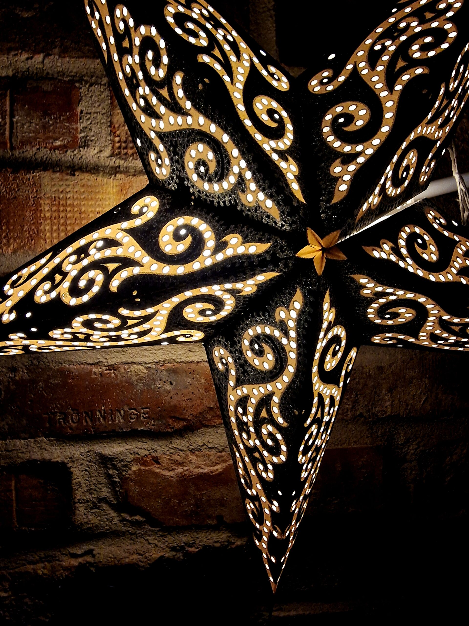 14. Svart Julstjärna med silverglitter sida