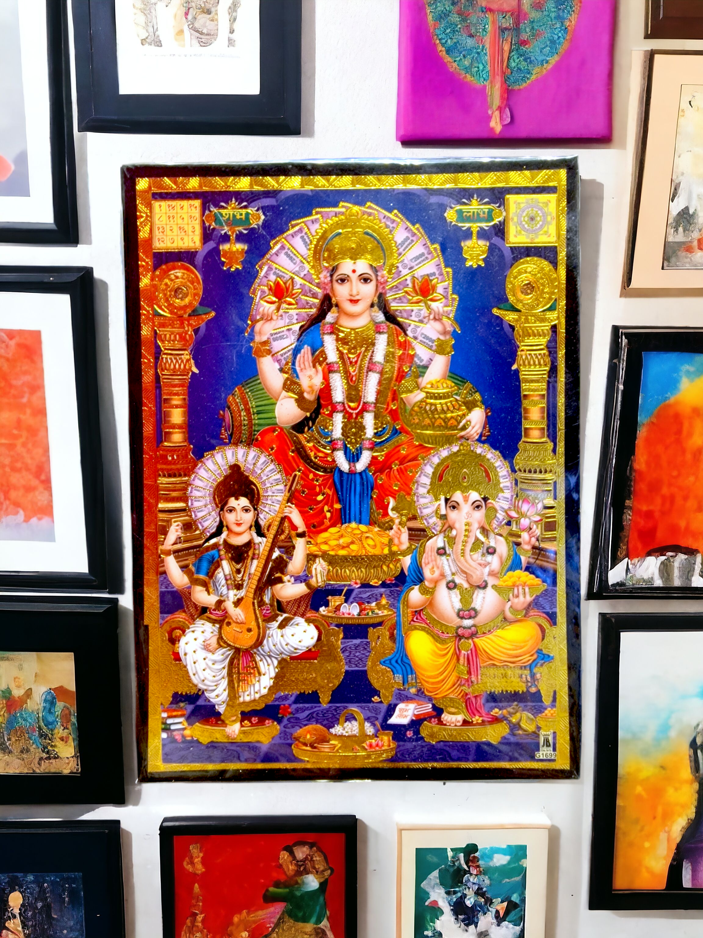 Tavla Lakshmi, saraswati och ganesh